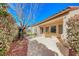 Enjoy outdoor living on this covered back patio with mature landscaping and space for entertaining at 2357 Wisconsin Dells Dr, Henderson, NV 89044