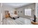 Cozy bedroom with a full-sized bed and a TV at 2357 Wisconsin Dells Dr, Henderson, NV 89044