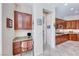 Cozy built-in desk area with granite countertop, matching cabinetry, and easy access to the kitchen at 2357 Wisconsin Dells Dr, Henderson, NV 89044