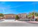 Charming single-story home features a three-car garage and beautiful desert landscaping at 2357 Wisconsin Dells Dr, Henderson, NV 89044