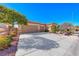 Beautiful home with a three-car garage and a spacious driveway at 2357 Wisconsin Dells Dr, Henderson, NV 89044