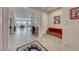 Inviting foyer features a decorative rug, tiled floor, and a glimpse of the dining area at 2357 Wisconsin Dells Dr, Henderson, NV 89044