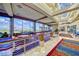 Elegant lobby featuring stylish seating, floor-to-ceiling windows, and scenic golf course views at 2357 Wisconsin Dells Dr, Henderson, NV 89044