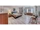 Spacious primary bedroom with a seating area and plank flooring at 2357 Wisconsin Dells Dr, Henderson, NV 89044