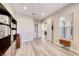 Versatile office area with wood floors, French doors, storage shelves, and a bright and airy atmosphere at 2357 Wisconsin Dells Dr, Henderson, NV 89044