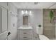 Renovated bathroom featuring a modern vanity and stylish tile shower at 2451 N Rainbow Blvd # 1150, Las Vegas, NV 89108