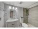 Bathroom featuring a modern vanity, square mirror and stylish tiled shower at 2451 N Rainbow Blvd # 1150, Las Vegas, NV 89108