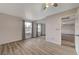 Spacious bedroom featuring new wood-look floors, mirrored closet, and lots of natural light at 2451 N Rainbow Blvd # 1150, Las Vegas, NV 89108