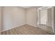 Bedroom with wood-look vinyl flooring and a doorway to the bathroom at 2451 N Rainbow Blvd # 1150, Las Vegas, NV 89108