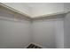 Walk-in closet featuring white walls, ample shelving and modern trim at 2451 N Rainbow Blvd # 1150, Las Vegas, NV 89108