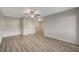 Open-concept living room with neutral walls and wood-look flooring at 2451 N Rainbow Blvd # 1150, Las Vegas, NV 89108