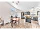 Spacious kitchen with tile flooring, black cabinets, butcher block island and ample counter space at 2459 Avenida Cataluna, Henderson, NV 89074