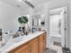 Bathroom featuring a white sink vanity and a mirror, and a bathtub at 2526 Begonia Valley Ave, Henderson, NV 89074