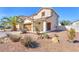 Two-story home with desert landscaping, a two-car garage, and a covered front entry at 2526 Begonia Valley Ave, Henderson, NV 89074