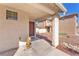 Covered front porch with a decorative lion statue at 2526 Begonia Valley Ave, Henderson, NV 89074