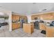 Bright kitchen with stainless steel appliances, light wood cabinets, and a central island at 2526 Begonia Valley Ave, Henderson, NV 89074