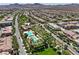 This aerial showcases community amenities like pools and lush greenery, all interwoven into the neighborhood at 2641 Via Monet, Henderson, NV 89044