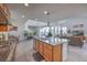 Bright kitchen and living area with an open floor plan and modern finishes at 2641 Via Monet, Henderson, NV 89044