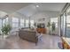 Comfortable living room filled with natural light and stylish decor at 2641 Via Monet, Henderson, NV 89044