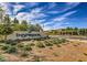 The community signage welcomes residents and guests with lush landscaping and inviting aesthetics at 2641 Via Monet, Henderson, NV 89044