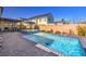 Inviting swimming pool and spa in a private backyard with plenty of space for lounging and enjoying the outdoors at 2641 Via Monet, Henderson, NV 89044