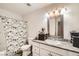 Cozy bathroom featuring a shower-tub combo, a toilet, and a granite-look vanity top at 275 N Lamb Blvd # E, Las Vegas, NV 89110