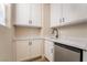 Elegant bar area featuring modern appliances, white cabinets, and marble countertops at 350 Robledo St, Las Vegas, NV 89138