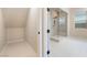 Modern bathroom featuring a glass shower with a rain shower head and tile flooring at 350 Robledo St, Las Vegas, NV 89138