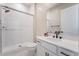 Modern bathroom showcasing a spacious glass-enclosed shower and contemporary vanity with black fixtures at 350 Robledo St, Las Vegas, NV 89138