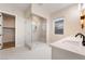 Bright bathroom with glass-enclosed shower and dual vanity with modern fixtures at 350 Robledo St, Las Vegas, NV 89138