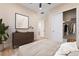 Comfortable bedroom featuring light-colored wood floors and a closet with sliding doors at 350 Robledo St, Las Vegas, NV 89138