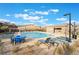 Community pool offers ample seating, lounge chairs and large swimming area at 350 Robledo St, Las Vegas, NV 89138