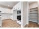 Bright kitchen features stainless steel appliances and large pantry at 350 Robledo St, Las Vegas, NV 89138