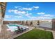 Backyard features a rectangular pool with a lounge area at 350 Robledo St, Las Vegas, NV 89138