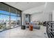 Modern bedroom with marble floors and floor-to-ceiling windows at 353 E Bonneville Ave # 1407, Las Vegas, NV 89101