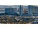 Stunning cityscape view features prominent hotels and residential high rises set against a backdrop of distant mountains at 353 E Bonneville Ave # 1407, Las Vegas, NV 89101