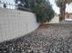 Stone landscaping and partial wall add curb appeal at 3647 Ottawa Cir, Las Vegas, NV 89169