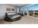 Modern bedroom with a unique round bed and expansive views of the city at 4525 Dean Martin Dr # 1500, Las Vegas, NV 89103