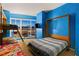 Vibrant bedroom featuring bunk beds, a murphy bed and amazing city views at 4525 Dean Martin Dr # 1500, Las Vegas, NV 89103