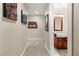 Hallway featuring stylish artwork and leads to a modern bathroom with a vessel sink at 4525 Dean Martin Dr # 1500, Las Vegas, NV 89103