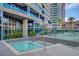 Cozy hot tub with tiled accents, surrounded by lush greenery and modern design at 4525 Dean Martin Dr # 1500, Las Vegas, NV 89103