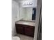 Bathroom with granite countertop vanity and neutral tile flooring at 4965 Indian River Dr # 101, Las Vegas, NV 89103