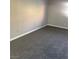 Bedroom featuring gray walls and plush gray carpeting at 4965 Indian River Dr # 101, Las Vegas, NV 89103