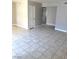 Spacious living area featuring tile floors, neutral paint, and ample space for furnishings and decor at 4965 Indian River Dr # 101, Las Vegas, NV 89103