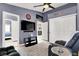 Relaxing living room with tv, doorway to bedroom, doorway to bathroom, and sliding door closet at 5049 Forest Oaks Dr, Las Vegas, NV 89149