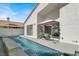 Relaxing pool with an attached gazebo and outdoor seating, great for cooling off in the desert heat at 5049 Forest Oaks Dr, Las Vegas, NV 89149