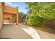 The covered patio overlooks a well-maintained yard with desert landscaping at 505 Los Dolces St, Las Vegas, NV 89138