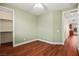 An empty bedroom featuring hardwood floors and a walk-in closet at 505 Los Dolces St, Las Vegas, NV 89138