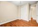 Cozy bedroom featuring hardwood floors and a closet at 505 Los Dolces St, Las Vegas, NV 89138