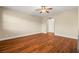 An open-concept living room with hardwood floors and neutral-colored walls at 505 Los Dolces St, Las Vegas, NV 89138